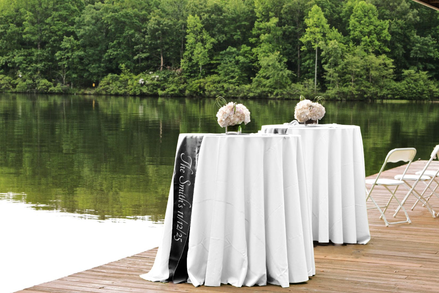 Cocktail table for rent. Table has personalized sash. To be used at wedding or other outdoor event.